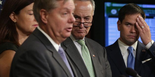 WASHINGTON, DC - JULY 24: U.S. Sen. Lindsey Graham (R-SC) (2nd L) speaks as (L-R) Sen. Kelly Ayotte (R-NH), Sen. Charles Schumer (D-NY), and Sen. Marco Rubio (R-FL) listen during a news conference July 24, 2014 on Capitol Hill in Washington, DC. The senators held a news conference to discuss the conflict between Israel and Hamas. (Photo by Alex Wong/Getty Images)