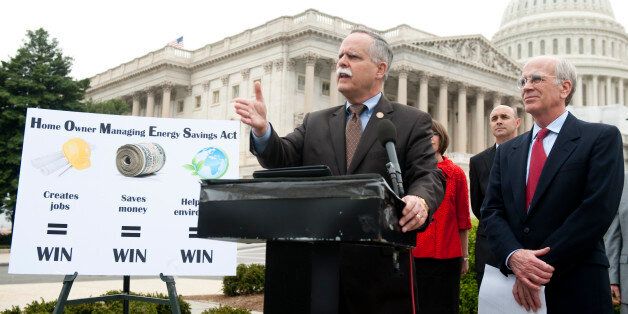 UNITED STATES â MARCH 21: From left, Rep. David McKinley, R-W.Va., and Rep. Peter Welch, D-Vt., hold a news conference on energy efficiency and the Home Owner Managing Energy Savings Act outside of the Capitol on Wednesday, March 21, 2012. (Photo By Bill Clark/CQ Roll Call)