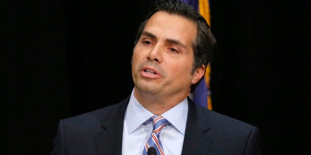 Independent candidate Greg Orman answers a question during a debate with Sen. Pat Roberts, R-Kan., in Overland Park, Kan., Wednesday, Oct. 8, 2014. (AP Photo/Orlin Wagner)