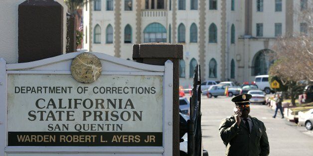 SAN QUENTIN, CA - JANUARY 22: A guard stands at the entrance to the California State Prison at San Quentin January 22, 2007 in San Quentin, California. The U.S. Supreme court threw out California's sentencing law on Monday, a decision that could reduce sentences for thousands of inmates in the California State correctional facilities. (Photo by Justin Sullivan/Getty Images)