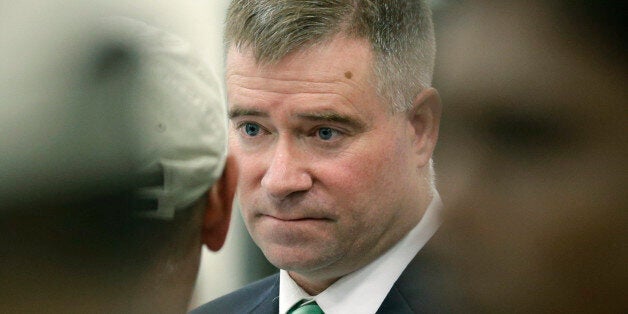 Rep. Chris Gibson, R-N.Y., talks with job seekers during a job fair his office co-hosted at Columbia-Greene Community College on Tuesday, April 22, 2014, in Hudson, N.Y. He is running against Democrat Sean Eldridge. (AP Photo/Mike Groll)