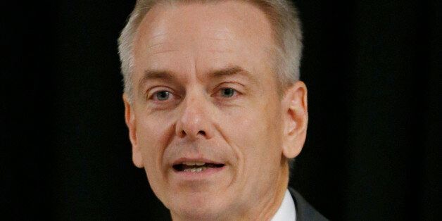 In this Thursday, June 12, 2014 photo, former state Sen. Steve Russell, candidate for Oklahoma's only open seat in the U.S. House, speaks during a political forum in Edmond, Okla. Oklahomaâs only open seat in the U.S. House has opened a floodgate of interest among candidates who hope to succeed Republican U.S. Rep. James Lankford, who is stepping down after two terms representing Oklahomaâs 5th Congressional District to run for the U.S. Senate. (AP Photo/Sue Ogrocki)