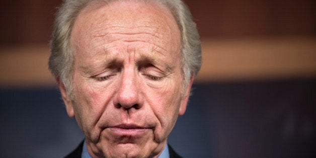 US Senator Joe Lieberman (I-CT) pauses while speaking during a press conference on Capitol Hill December 11, 2012 in Washingt
