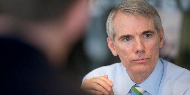 Senator Rob Portman, a Republican from Ohio, speaks during an interview in Washington, D.C., U.S., on Thursday, July 10, 2014. Portman, who may run for president in 2016, said Hillary Clinton's potential Democratic campaign for the White House won't intimidate others from seeking the office. Photographer: Andrew Harrer/Bloomberg via Getty Images 