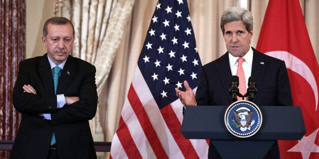 WASHINGTON, DC - MAY 16: U.S. Secretary of State John Kerry (R) speaks as Prime Minister of Turkey Recep Tayyip Erdogan (L) listens during a luncheon at the State Department May 16, 2013 in Washington, DC. Prime Minister Erdogan was on a visit in Washington and had talks on Syria with U.S. President Barack Obama. (Photo by Alex Wong/Getty Images)