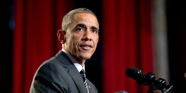 President Barack Obama speaks about the ongoing events is Ferguson, Mo., before speaking at the Copernicus Community Center in Chicago to discuss immigration reform, Tuesday, Nov. 25, 2014. (AP Photo/Pablo Martinez Monsivais)