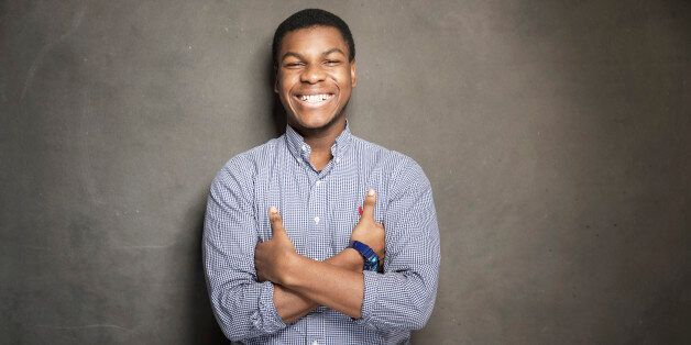 John Boyega poses for a portrait at Quaker Good Energy Lodge with GenArt and the Collective , during the Sundance Film Festival, on Monday, Jan. 20, 2014 in Park City, Utah. (Photo by Victoria Will/Invision/AP)
