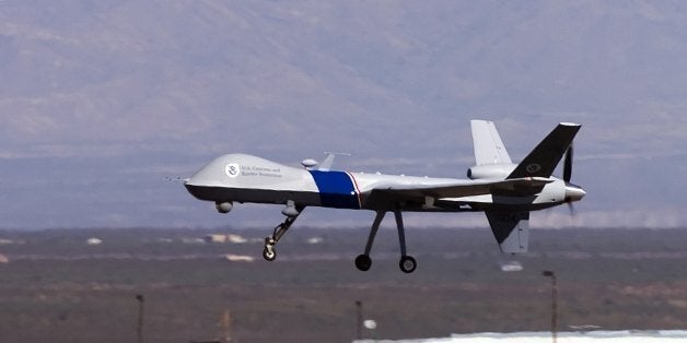 SIERRA VISTA, AZ - OCTOBER 30: The new MQ-9 Predator B, an unmanned surveillance aircraft system, unveiled by the U.S. Customs and Border Protection (CBP), takes off at Libby Army Airfield at Ft. Huachuca October 30, 2006 in Sierra Vista, Arizona. CBP will use the new MQ-9 Predator aircraft to patrol the southern border of the United Sates in order to stop the illegal entry of thousands of Mexican nationals and drug runners who use the vast expanses of the Sonoran desert to cross into southern Arizona, daily. The new unarmed plane flew briefly for the press to show off its surveillance capabilities by pilots of the contractor, General Atomics Aeronautical Systems. Agents of CBP will start training on the use of the aircraft very soon. The Predator will start full scale flight operations along the Mexico-Arizona border today. (Photo by Gary Williams/Getty Images)