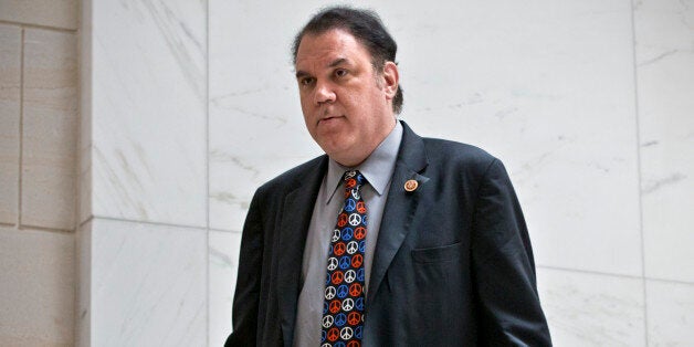 In this Sept. 5, 2013 file photo, Rep. Alan Grayson, R-Fla., arrives to join lawmakers and national security officials at the
