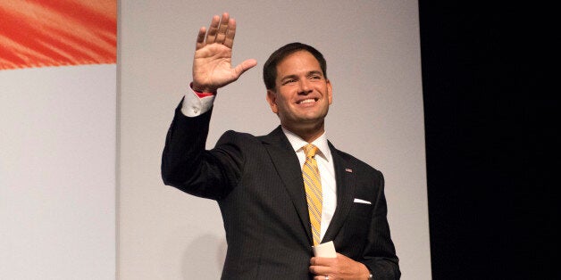 Senator Marco Rubio, R-Fla. waves while leaving after speaking at the Faith and Freedom Coalition's Road to Majority event in Washington, Thursday, June 19, 2014. Some of the Republican Party's most ambitious leaders are courting religious conservatives as evangelical Christians claim new momentum in their fight for the GOP's soul. (AP Photo/Molly Riley)