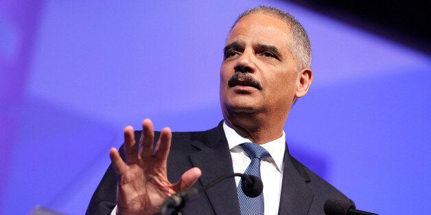 WASHINGTON, DC - OCTOBER 25: U.S. Attorney General Eric Holder speaks at the 18th Annual HRC National Dinner at The Walter E. Washington Convention Center on October 25, 2014 in Washington, DC. (Photo by Paul Morigi/Getty Images)