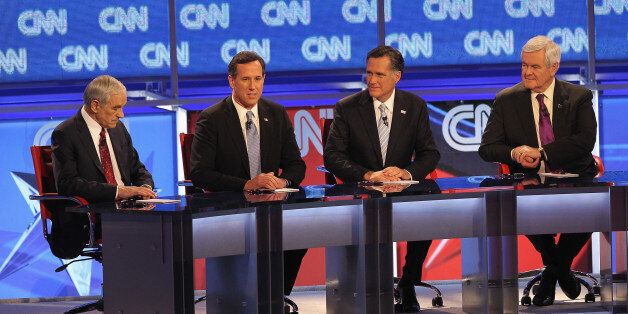 MESA, AZ - FEBRUARY 22: Republican presidential candidates (L-R) U.S. Rep. Ron Paul (R-TX), former U.S. Sen. Rick Santorum, former Massachusetts Gov. Mitt Romney, and former Speaker of the House Newt Gingrich participate in a debate sponsored by CNN and the Republican Party of Arizona at the Mesa Arts Center February 22, 2012 in Mesa, Arizona. The debate is the last one scheduled before voters head to the polls in Arizona's primary on February 28 and Super Tuesday on March 6. (Photo by Justin Sullivan/Getty Images)