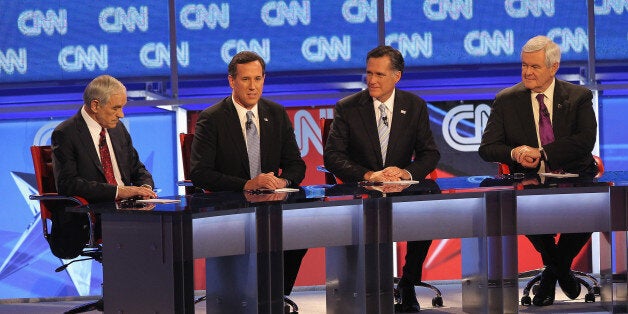 MESA, AZ - FEBRUARY 22: Republican presidential candidates (L-R) U.S. Rep. Ron Paul (R-TX), former U.S. Sen. Rick Santorum,