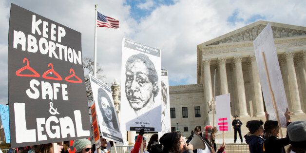 UNITED STATES - JANUARY 22: Pro-choice protesters chant in front of the Supreme Court on Thursday, Jan. 22, 2015, the anniversary of the Roe v Wade abortion decision. (Photo By Bill Clark/CQ Roll Call)