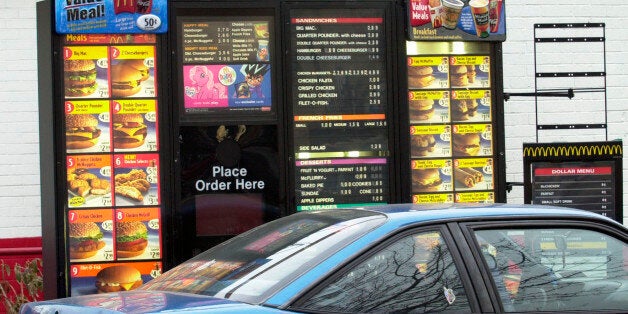 A customer places an order at the driveup menu board at a McDonald's in Newark, N.J., Tuesday, Feb. 8, 2005. New Jersey is co