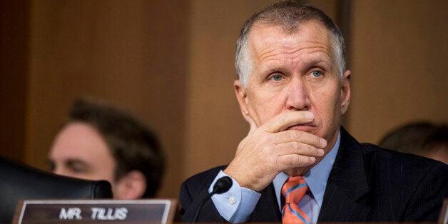 UNITED STATES - JANUARY 28: Sen. Thom Tillis, R-N.C., listens as U.S. Attorney General nominee Loretta Lynch testifies during her confirmation hearing in the Senate Judiciary Committee on Wednesday, Jan. 28, 2015. (Photo By Bill Clark/CQ Roll Call)