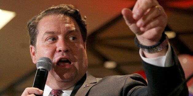 Arizona Republican candidate for Attorney General Mark Brnovich talks to supporters at the Republican election night party Tuesday, Nov. 4, 2014, in Phoenix. (AP Photo/Ross D. Franklin)