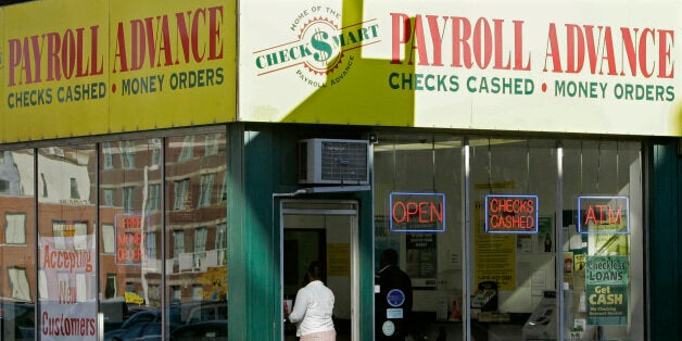 A customer enters a Payroll Advance location, Thursday, Nov. 6, 2008, in Cincinnati, Ohio. Voters approved an issue that upho