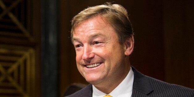 UNITED STATES - MAY 15: Sen. Dean Heller, R-Nev., takes his seat before the start of the Senate Veterans' Affairs Committee hearing on 'The State of VA Health Care' on Thursday, May 15, 2014. (Photo By Bill Clark/CQ Roll Call)