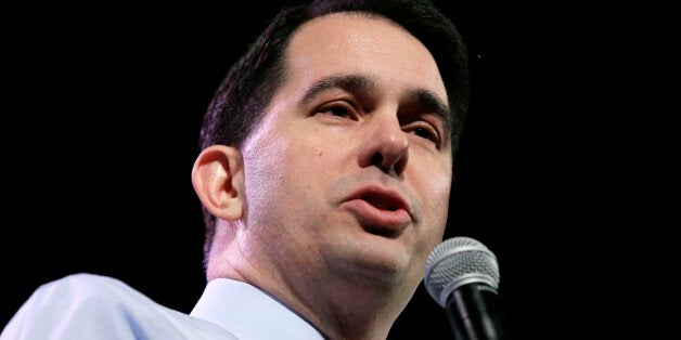 FILE - In this Jan. 24, 2015 file photo, Wisconsin Gov. Scott Walker speaks during the Freedom Summit in Des Moines, Iowa. Shifting his focus to Washington, Walker is expanding his political operation as he fights for early momentum in the increasingly crowded field of GOP White House prospects. The two-term Republican governor will address a Washington audience for the first time this year on Friday afternoon, (AP Photo/Charlie Neibergall, File)