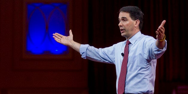 Scott Walker, governor of Wisconsin, speaks during the Conservative Political Action Conference (CPAC) in National Harbor, Maryland, U.S., on Thursday, Feb. 26, 2015. The 42nd annual CPAC, which runs until Feb. 28, features most of the potential Republican candidates for president, from Ben Carson and Carly Fiorina to Jeb Bush and Scott Walker. Photographer: Andrew Harrer/Bloomberg via Getty Images