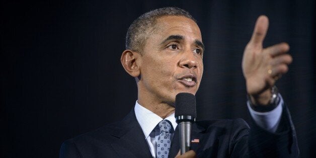 US President Barack Obama answers audience questions at the City Club of Cleveland March 18, 2015 in Cleveland, Ohio. Obama spoke about the middle class economy. AFP PHOTO/BRENDAN SMIALOWSKI (Photo credit should read BRENDAN SMIALOWSKI/AFP/Getty Images)