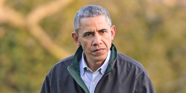 WASHINGTON, DC - MARCH 29: U.S. President Barack Obama returns to the White House March 29, 2015 in Washington, DC. The president was returning from a two-day trip to Palm City, Florida where he played golf. Photo by Ron Sachs-Pool via Getty Images)