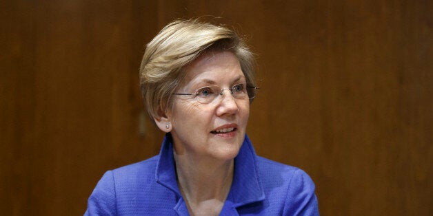 FILE - In this Jan. 8, 2015 file photo, Sen. Elizabeth Warren, D-Mass. is seen on Capitol Hill in Washington. Inside the Democratic Party, economic policy is often seen as a contest between President Barack Obama's track record and the anti-Wall Street approach sought by Massachusetts Sen. Elizabeth Warren. As Hillary Rodham Clinton heads for an expected run for president, her allies are pointing her toward something in-between. (AP Photo/J. Scott Applewhite, File)