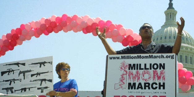 The Rev. Jesse Jackson addresses the crowd during the second "Million Mom March" at the Capitol in Washington Sunday, May 9, 2004. Several thousand people gathered at the Capitol to urge renewal of a federal ban on assault weapons. (AP Photo/Adele Starr)