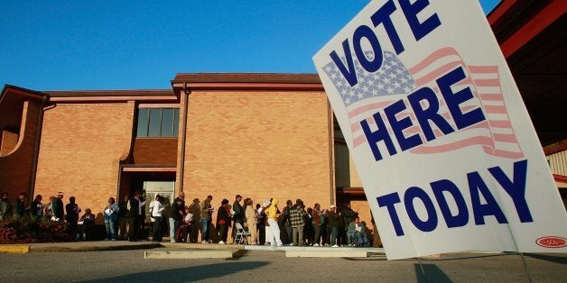 BIRMINGHAM, AL - NOVEMBER 04: African-Americans line up to vote outside Bethel Missionary Baptist Church in the presidential election November 4, 2008 in Birmingham, Alabama. Birmingham, along with Selma and Montgomery, were touchstones in the civil rights movement where Dr. Martin Luther King Jr. led massive protests which eventually led to the Voting Rights Act of 1965 ending voter disfranchisement against African-Americans. Americans are voting in the first presidential election featuring an African-American candidate, Democratic contender Sen. Barack Obama, who is running against Republican Sen. John McCain. (Photo by Mario Tama/Getty Images)