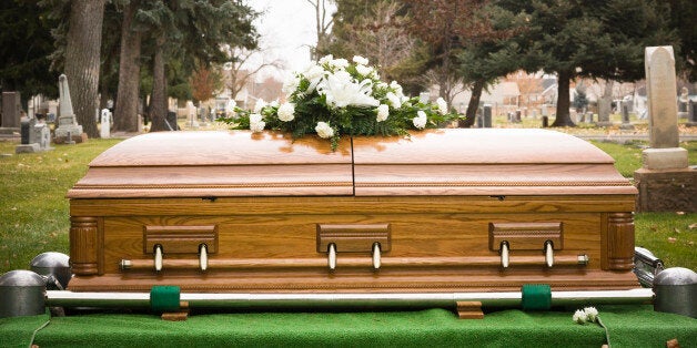 coffin at a cemetery