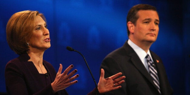 BOULDER, CO - OCTOBER 28: Presidential candidate Carly Fiorina (L) while Sen. Ted Cruz (R-TX) looks during the CNBC Republican Presidential Debate at University of Colorados Coors Events Center October 28, 2015 in Boulder, Colorado. Fourteen Republican presidential candidates are participating in the third set of Republican presidential debates. (Photo by Justin Sullivan/Getty Images)