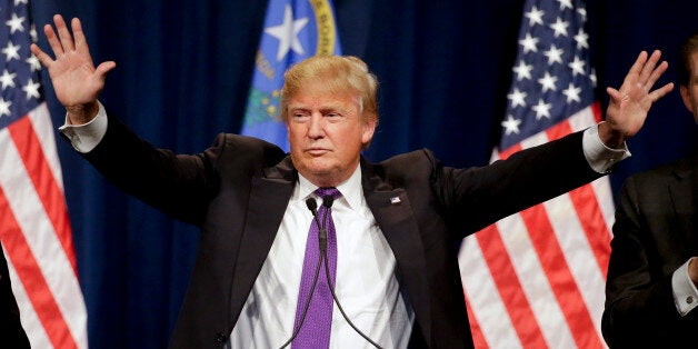 Republican presidential candidate Donald Trump speaks during a caucus night rally Tuesday, Feb. 23, 2016, in Las Vegas. (AP Photo/Jae C. Hong)