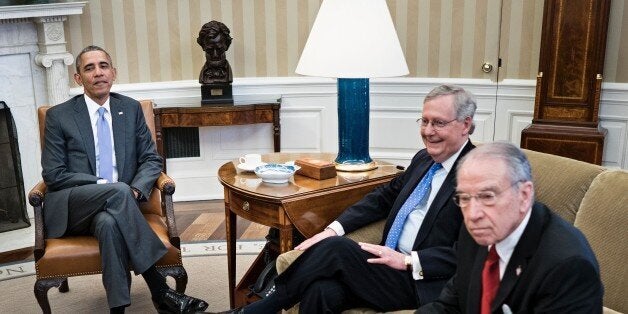 From left: US President Barack Obama, Senate Majority Leader Senator Mitch McConnell (R-KY) and Senator Chuck Grassley (R-IA) wait to begin a meeting about the Supreme Court vacancy in the Oval Office of the White House March 1, 2016 in Washington, DC. / AFP / Brendan Smialowski (Photo credit should read BRENDAN SMIALOWSKI/AFP/Getty Images)