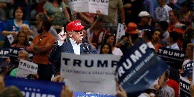 Republican presidential candidate Donald Trump speaks during a campaign rally Saturday, March 19, 2016, in Tucson, Ariz. (AP Photo/Ross D. Franklin)