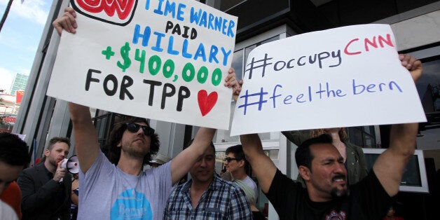 Bernie's supporters protest against the lack of Sanders coverage in front of the CNN building in Los Angeles, California, on April 3, 2016. / AFP / TOMMASO BODDI (Photo credit should read TOMMASO BODDI/AFP/Getty Images)