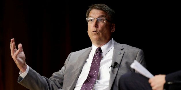 North Carolina Gov. Pat McCrory makes remarks concerning House Bill 2 while speaking during a government affairs conference in Raleigh, N.C., Wednesday, May 4, 2016. A North Carolina law limiting protections to LGBT people violates federal civil rights laws and can't be enforced, the U.S. Justice Department said Wednesday, putting the state on notice that it is in danger of being sued and losing hundreds of millions of dollars in federal funding. (AP Photo/Gerry Broome)