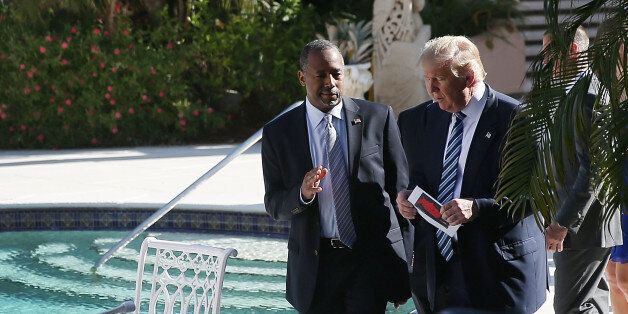 PALM BEACH, FL - MARCH 11: Republican presidential candidate Donald Trump walks with former presidential candidate Ben Carson before he receives his endorsement at the Mar-A-Lago Club on March 11, 2016 in Palm Beach, Florida. Presidential candidates continue to campaign before Florida's March 15th primary day. (Photo by Joe Raedle/Getty Images)