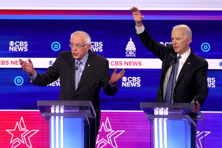 Sen. Bernie Sanders and former Vice President Joe Biden both have something to say during a presidential primary debate in Charleston, South Carolina.