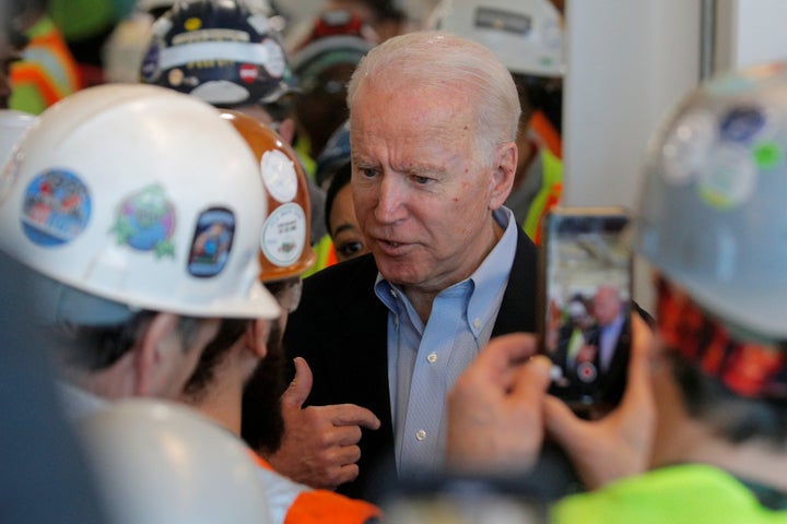 Former Vice President Joe Biden argues with a worker about his gun control policies during a campaign stop in Detroit.