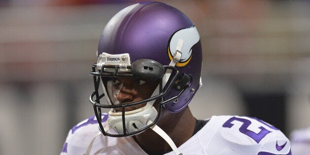 ST. LOUIS, MO - SEPTEMBER 7: Adrian Peterson #28 of the Minnesota Vikings warms up prior to a game against the St. Louis Rams at the Edward Jones Dome on September 7, 2014 in St. Louis, Missouri. (Photo by Michael B. Thomas/Getty Images)