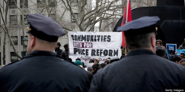 NEW YORK, NY - MARCH 18: New York CIty Police officers watch over a demonstration against the city's 'stop and frisk' search