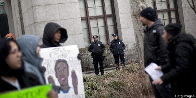 NEW YORK, NY - MARCH 18: New York CIty Police officers watch over a demonstration against the city's 'stop and frisk' searches in lower Manhattan near Federal Court March 18, 2013 in New York City. Hearings in a federal lawsuit filed by four black men against the city police department's 'stop and frisk' searches starts today in Manhattan Federal Court. (Photo by Allison Joyce/Getty Images)