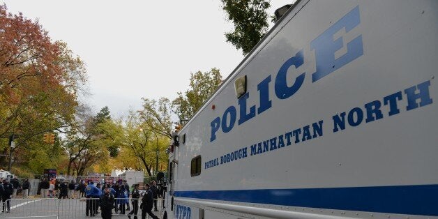 A New York Police Department comand center vehicle is stationed on Central Park West near the finish line before the New York City Marathon on November 3, 2013 in New York. AFP PHOTO/Stan HONDA (Photo credit should read STAN HONDA/AFP/Getty Images)