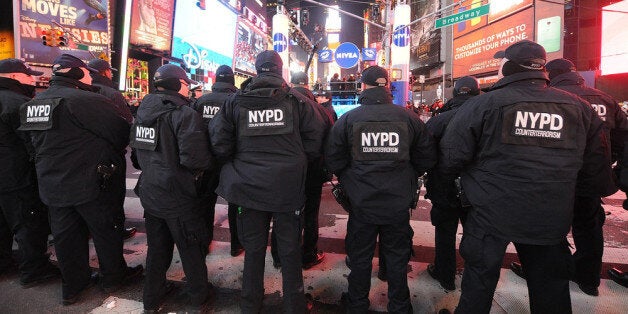 NEW YORK, NY - DECEMBER 31: Members of the New York City Police Department attend New Year's Eve 2013 With Carson Daly in T