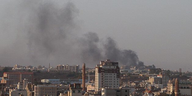 SANAA, YEMEN - SEPTEMBER 20: Smoke rises from the Yemen state television building after a shelling by Shiite Houthi militants in Sanaa, Yemen on September 20, 2014. (Photo by Samet Dogan/Anadolu Agency/Getty Images)