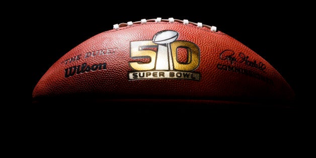 An official game ball for the NFL Super Bowl 50 football game is photographed, Tuesday, Jan. 26, 2016. The Wilson Sporting Goods football factory in Ada, Ohio has made the official Super Bowl football since the first Super Bowl in 1966. The company began making this year's game balls last Sunday night, Jan. 24, immediately after the conclusion of the NFC and AFC championship games. The Denver Broncos will play the Carolina Panthers in the Super Bowl on Feb. 7, in Santa Clara, Calif. (AP Photo/Rick Osentoski)