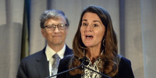 Renowned philanthropists Bill and Melinda Gates(R) receive the Lasker Award September 20, 2013. The Gates received the Lasker-Bloomberg Public Service Award for leading an historic transformation in the way we view the globes most pressing health concerns and improving the lives of millions of the worlds most vulnerable. AFP PHOTO / TIMOTHY CLARY (Photo credit should read TIMOTHY CLARY/AFP/Getty Images)