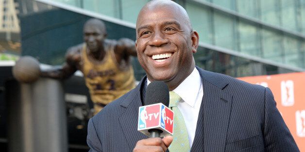 LOS ANGELES, CA - FEBRUARY 5: Earvin 'Magic' Johnson poses for a picture during a press conference to announce his purchase of the Los Angeles Sparks at STAPLES Center on February 5, 2014 in Los Angeles, California. NOTE TO USER: User expressly acknowledges and agrees that, by downloading and/or using this Photograph, user is consenting to the terms and conditions of the Getty Images License Agreement. Mandatory Copyright Notice: Copyright 2014 NBAE (Photo by Andrew D. Bernstein/NBAE via Getty Images)