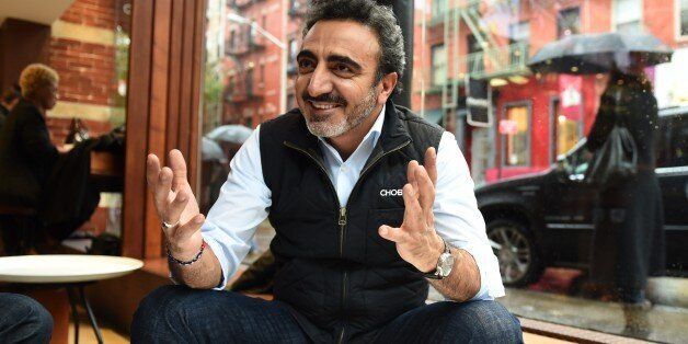 Turkish-American Hamdi Ulukaya, founder and CEO of Chobani, answers questions during an interview November 17, 2014 in New York. Chobani has become the best-selling yogurt in the US, netting more than one billion USD in annual sales. AFP PHOTO/Don Emmert (Photo credit should read DON EMMERT/AFP/Getty Images)